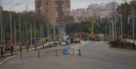 Первый слой асфальта на новом участке улицы Дикопольцева Евгений Попов